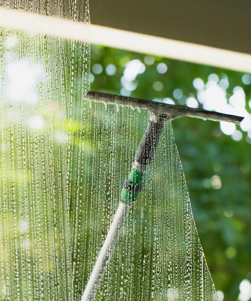 A close up of a window with water droplets